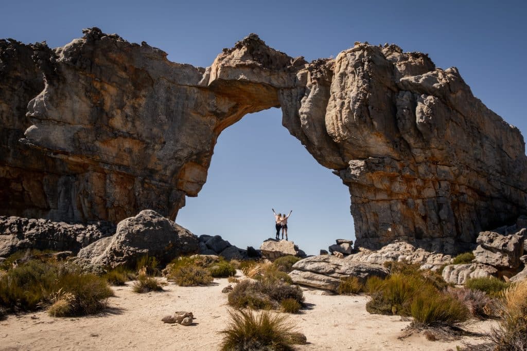 Trail Runners Under The Wolfberg Arch, Cederberg